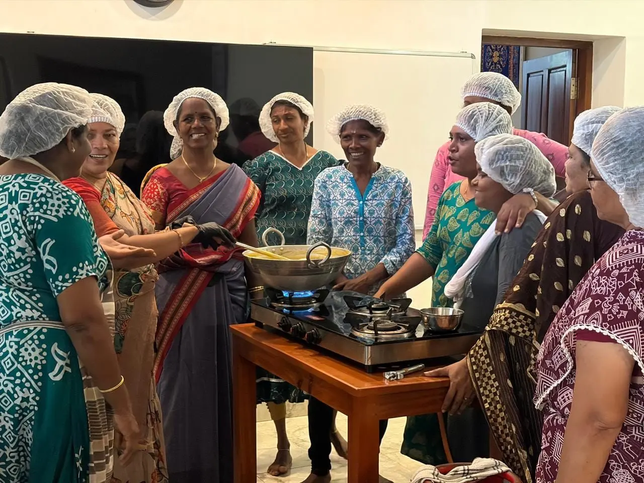 Club Members learning how to make pickles, jams, sauces instead of buying them