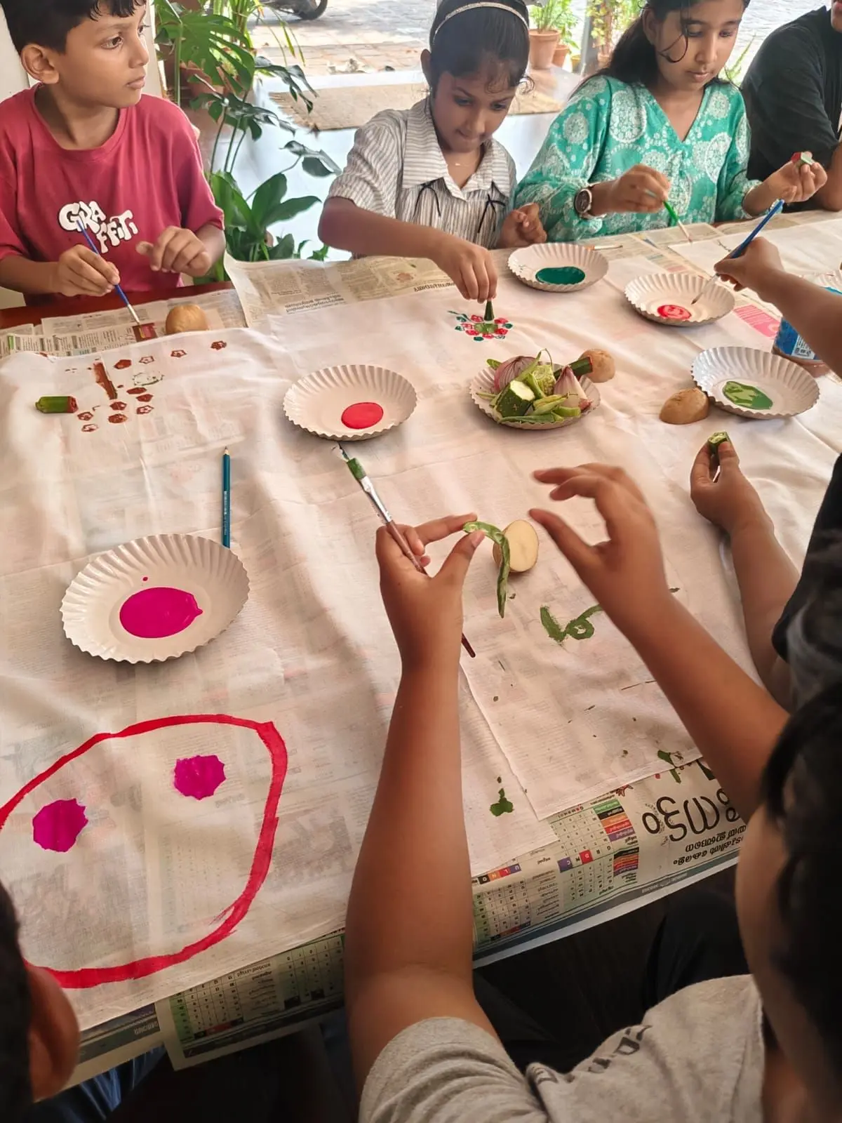 The summer camp opened with yoga and vegetable painting