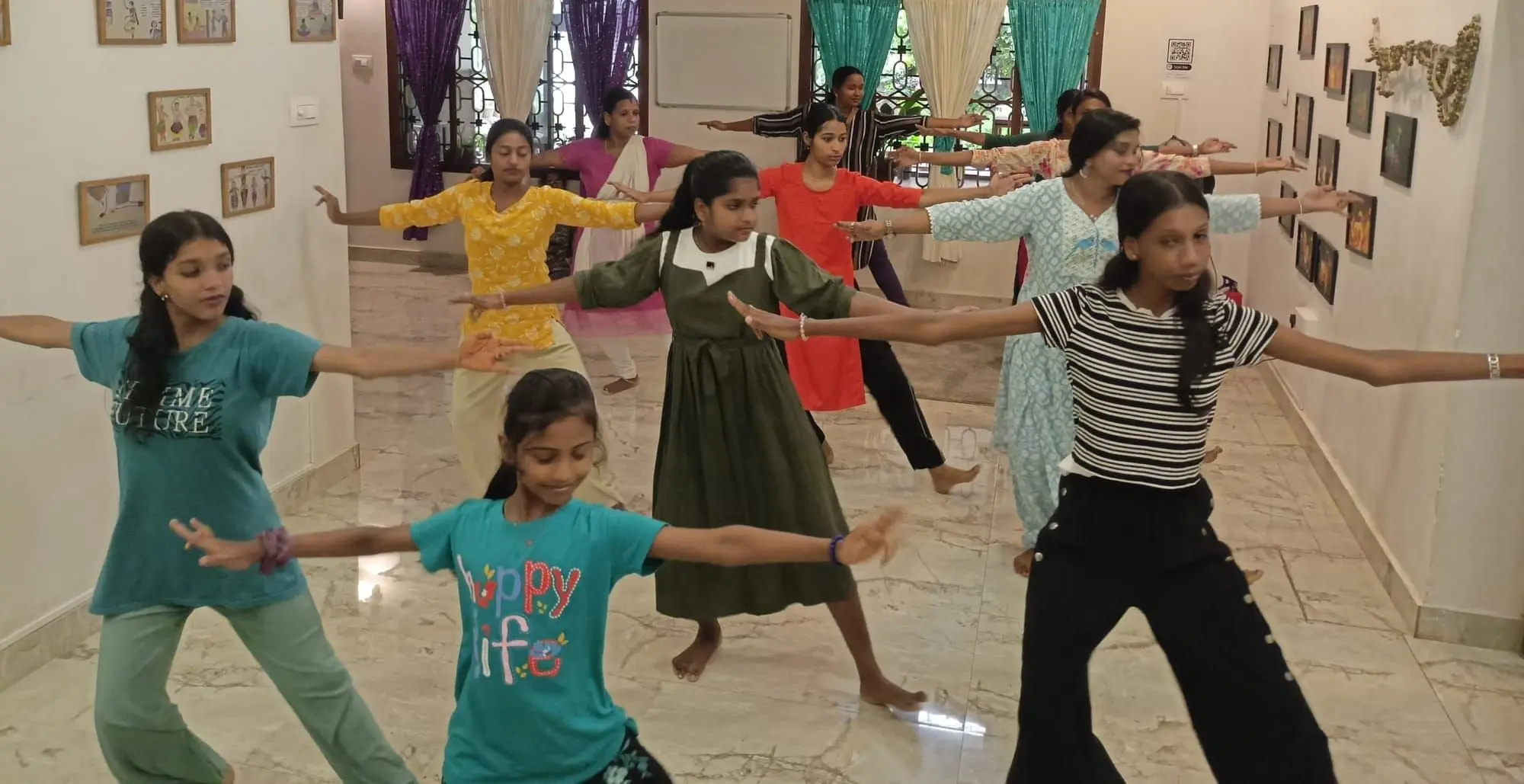 Community members practised basic Bharatanatyam steps