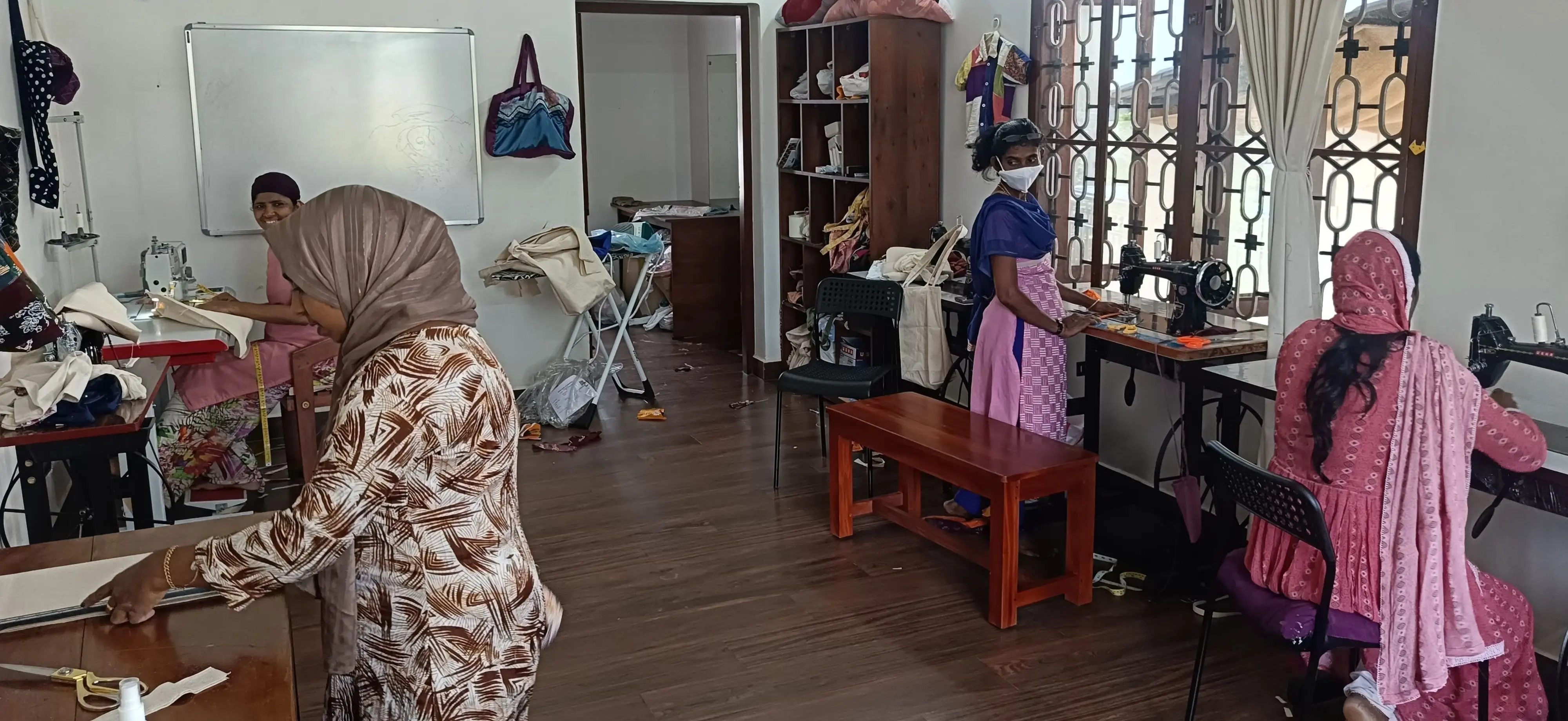 Stitching team balances new designs with current orders
